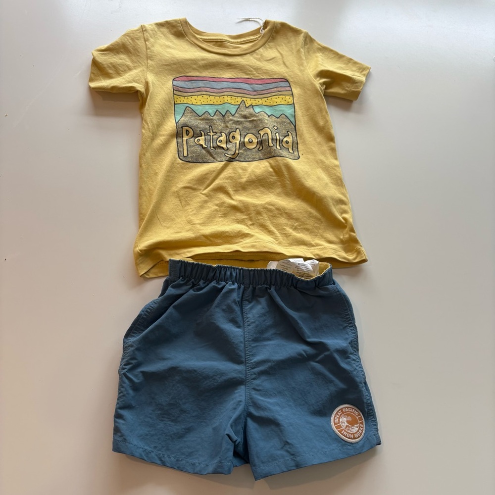 Patagonia Graphic Tee and Blue Shorts